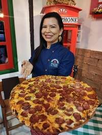 De acordo com Josilene Casseb, a pizza gigante é uma grande atração no salão da unidade da pizzaria localizada no município de Vigia de Nazaré