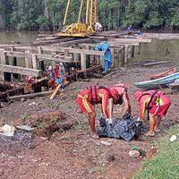 Populares encontram o corpo no Rio Maguari