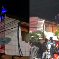 Imagens divulgadas nas redes sociais mostram o homem se locomovendo pelos telhados e até se equilibrando pela fiação elétrica das casas