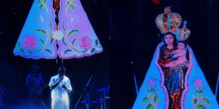 A homenagem de Thiaguinho foi acompanhada pela projeção de uma imagem da santa durante show na noite do domingo (11)